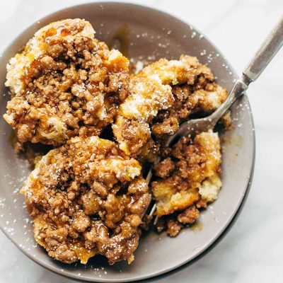 Cinnamon Streusel French Toast Cups on a plate with a fork.