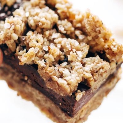 Salted Chocolate Snack Bar held by hand.